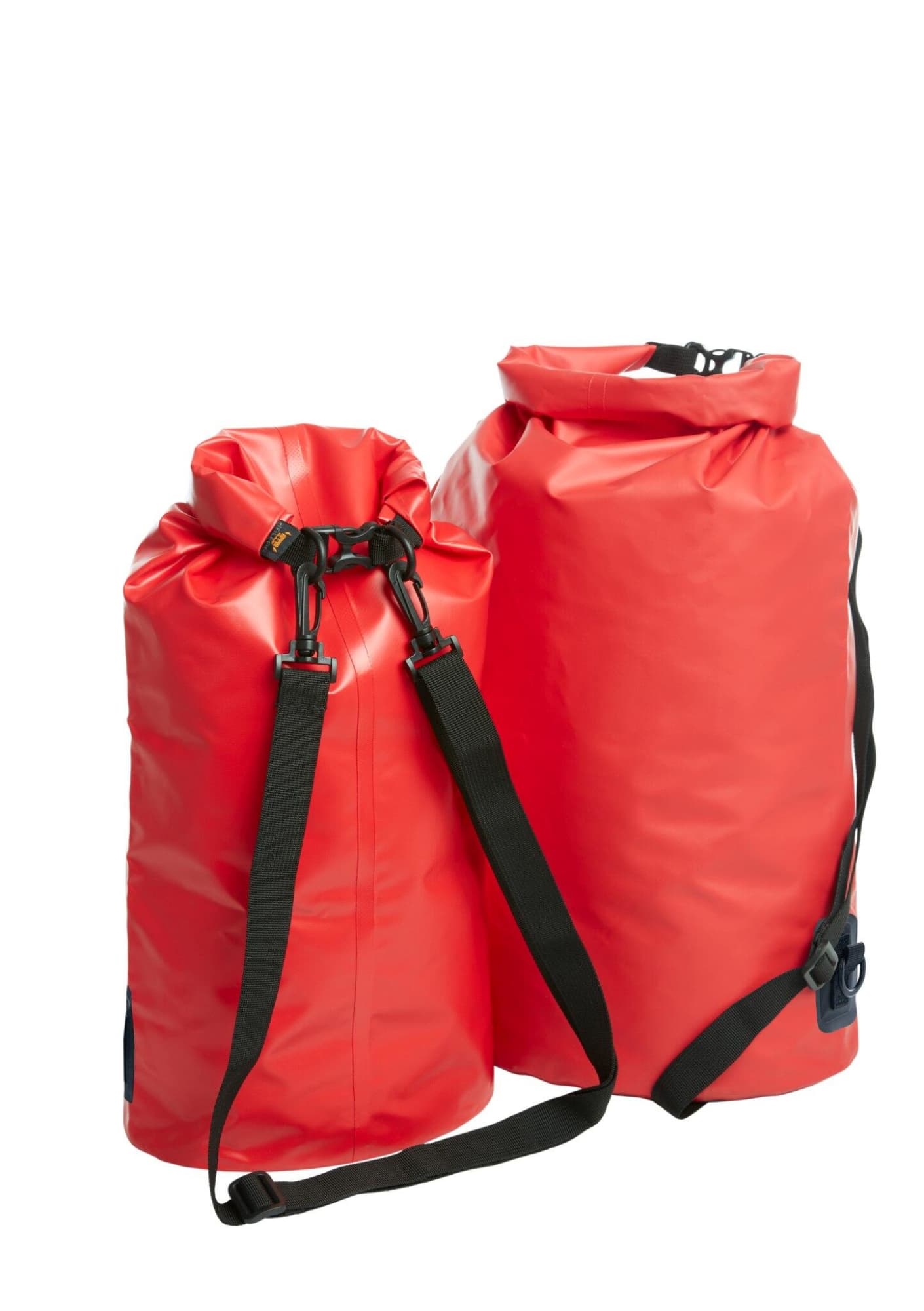 Two red dry bags, one larger and one smaller, featuring adjustable straps and a closure system.