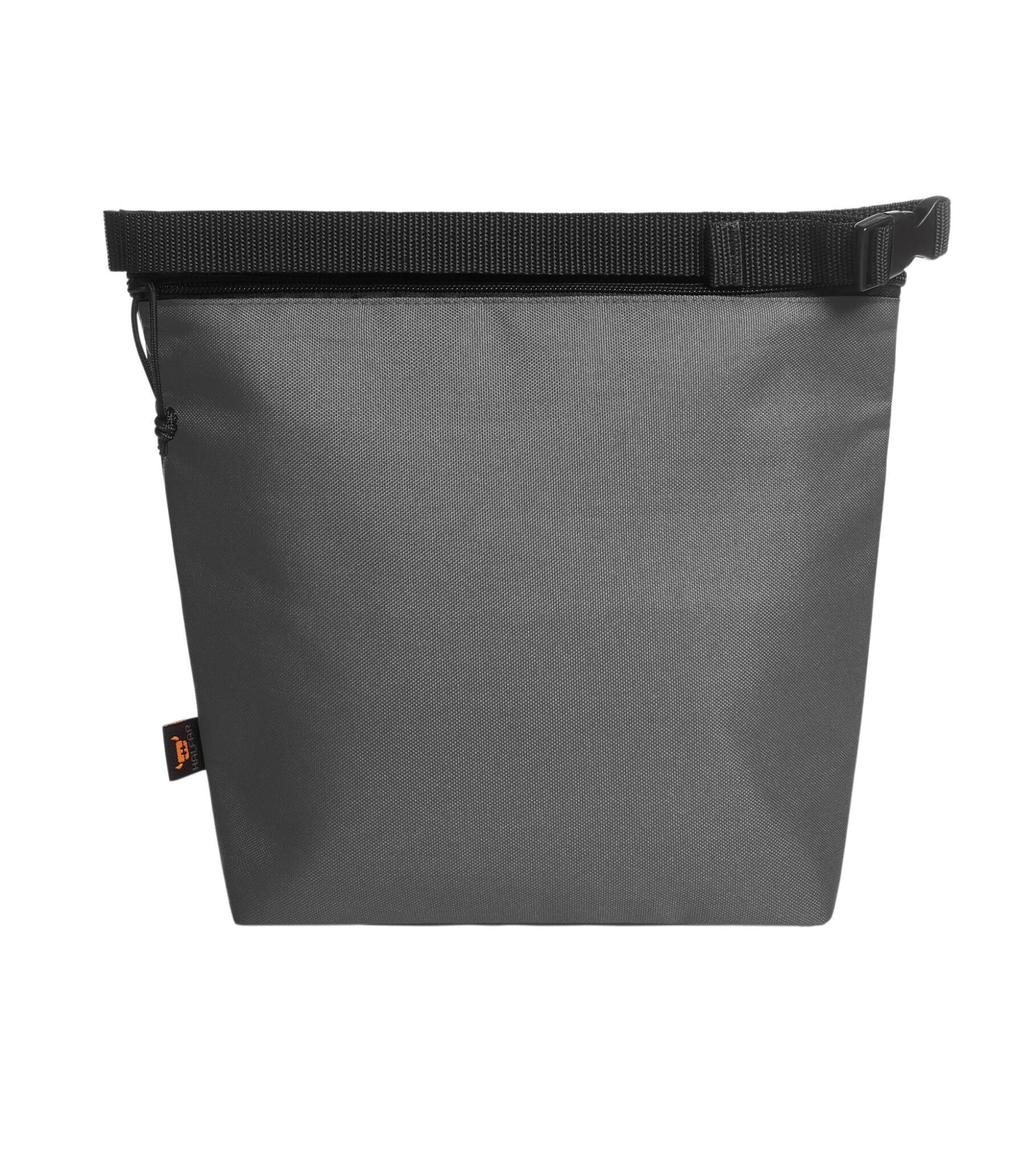 A grey cooler bag with a zip closure and adjustable strap. The bag features a branded logo.