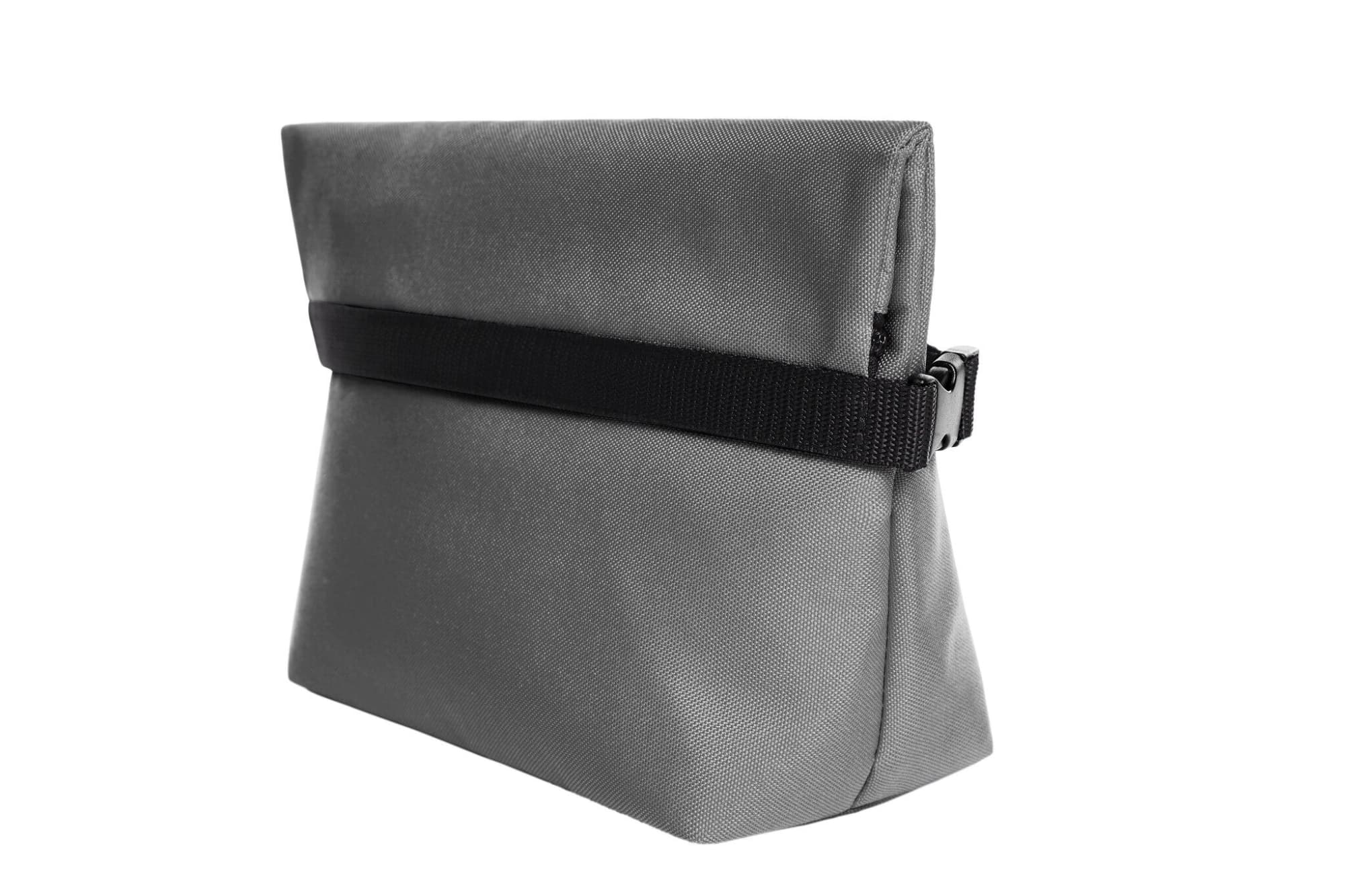 A grey cooler bag with a black strap, featuring a simple design and a zippered closure. It has a logo on the front.