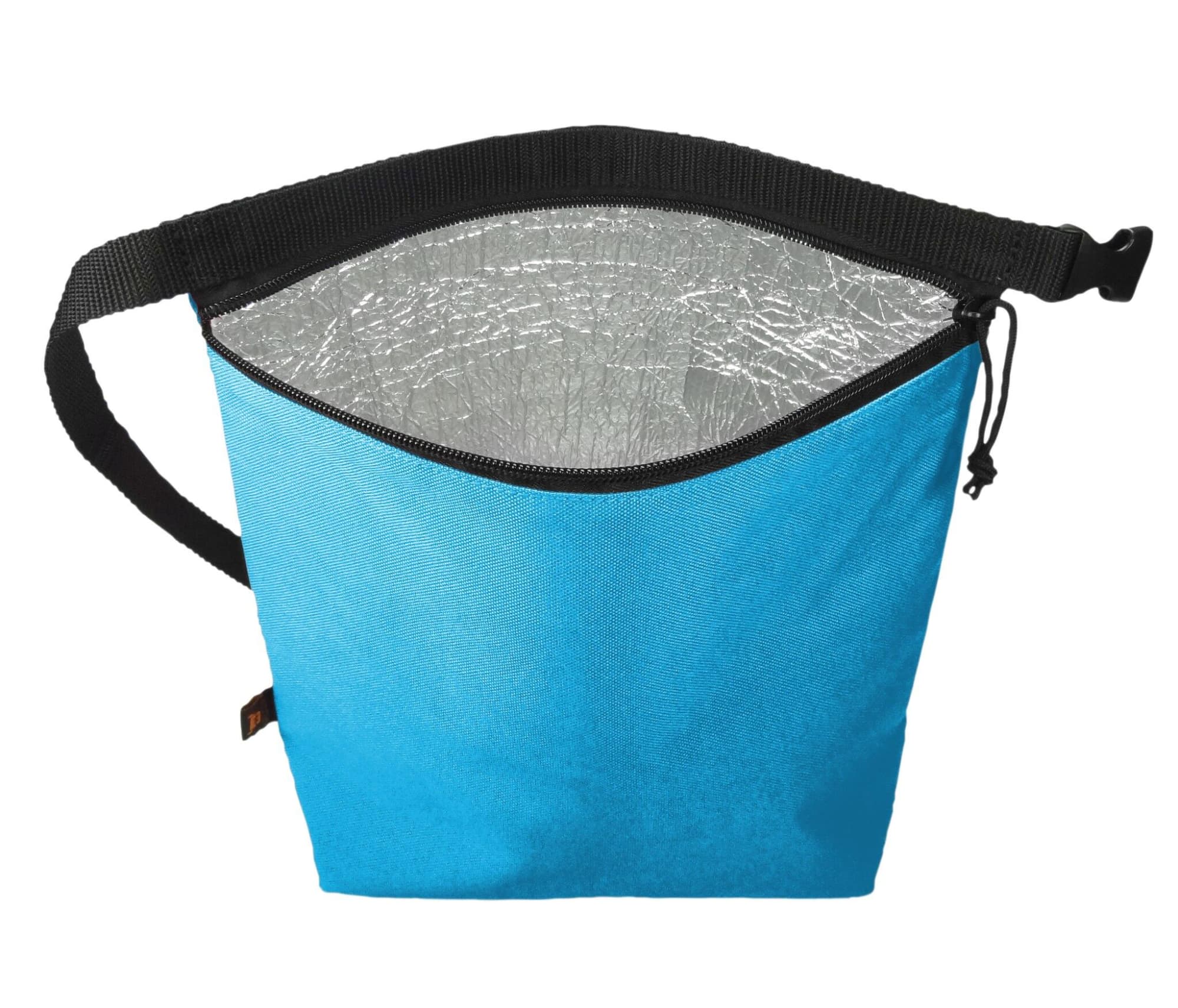 A blue cooler bag with an open top and silver insulated lining, featuring an adjustable strap and a zippered opening.