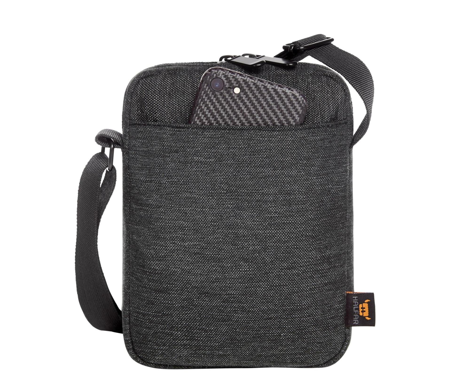 A grey crossbody bag with an adjustable strap and a front pocket containing a phone. It has a logo on the side.