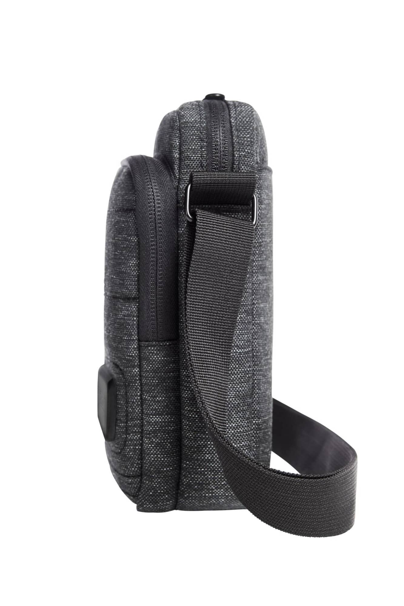 A grey crossbody bag with a shoulder strap and zipper closure, featuring a textured design and a logo.
