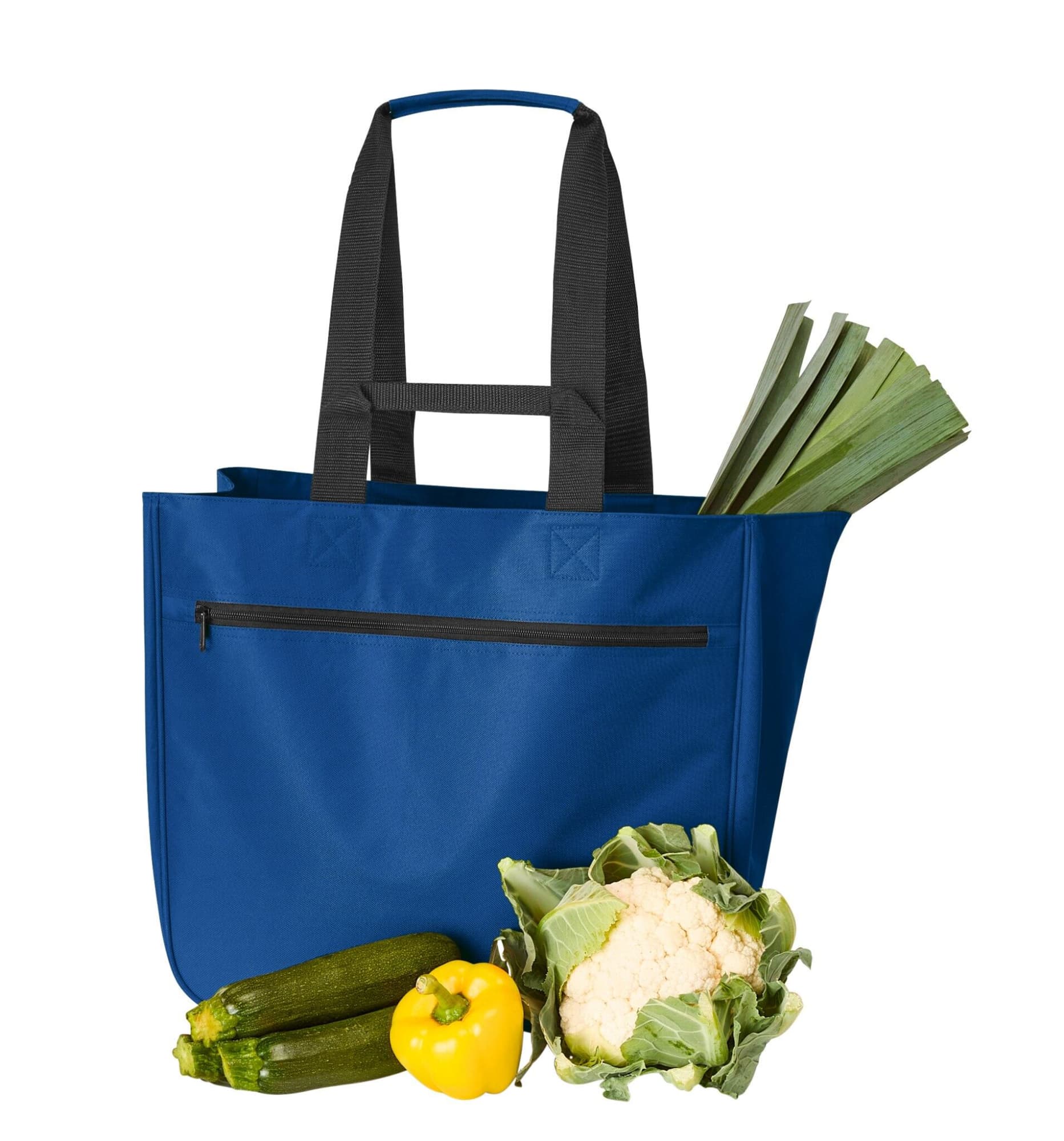 A blue tote bag with black straps, featuring vegetables including cauliflower, zucchini, leeks, and a yellow pepper. 