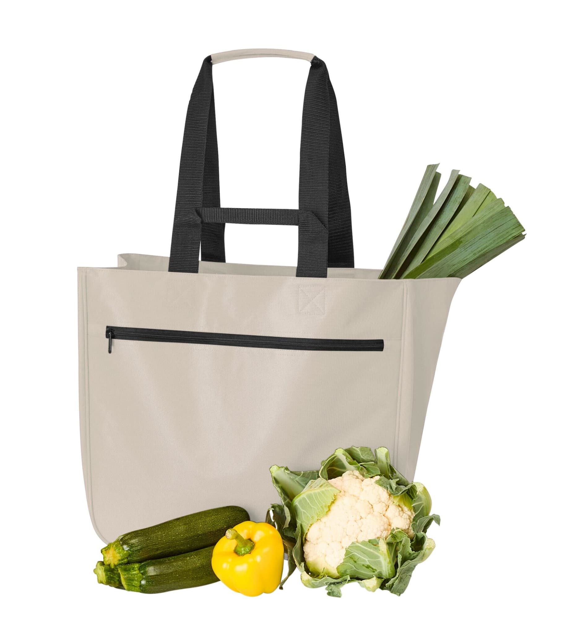 A grey tote bag with black straps, filled with zucchini, cauliflower, a yellow pepper, and leeks.