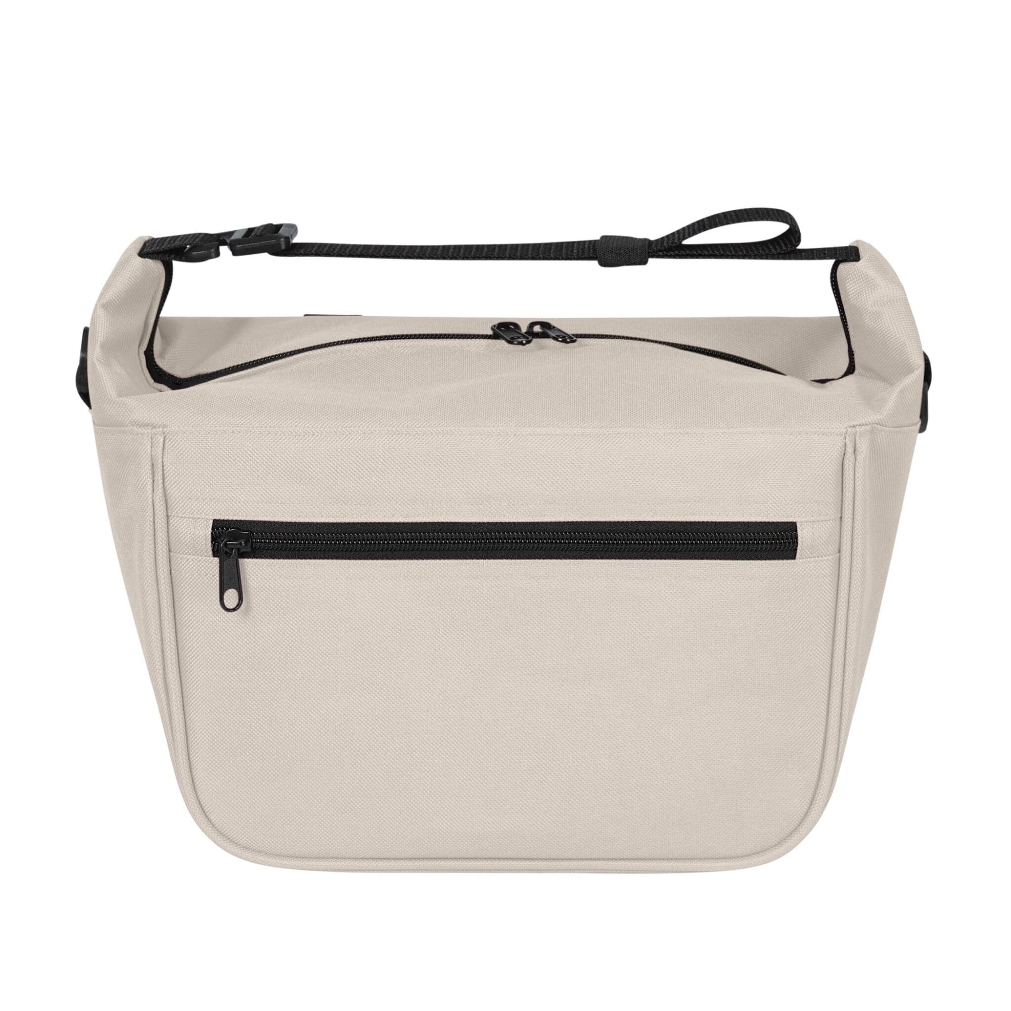 A soft beige lunch bag with a zippered front pocket and an adjustable strap. It features a simple design with a logo.