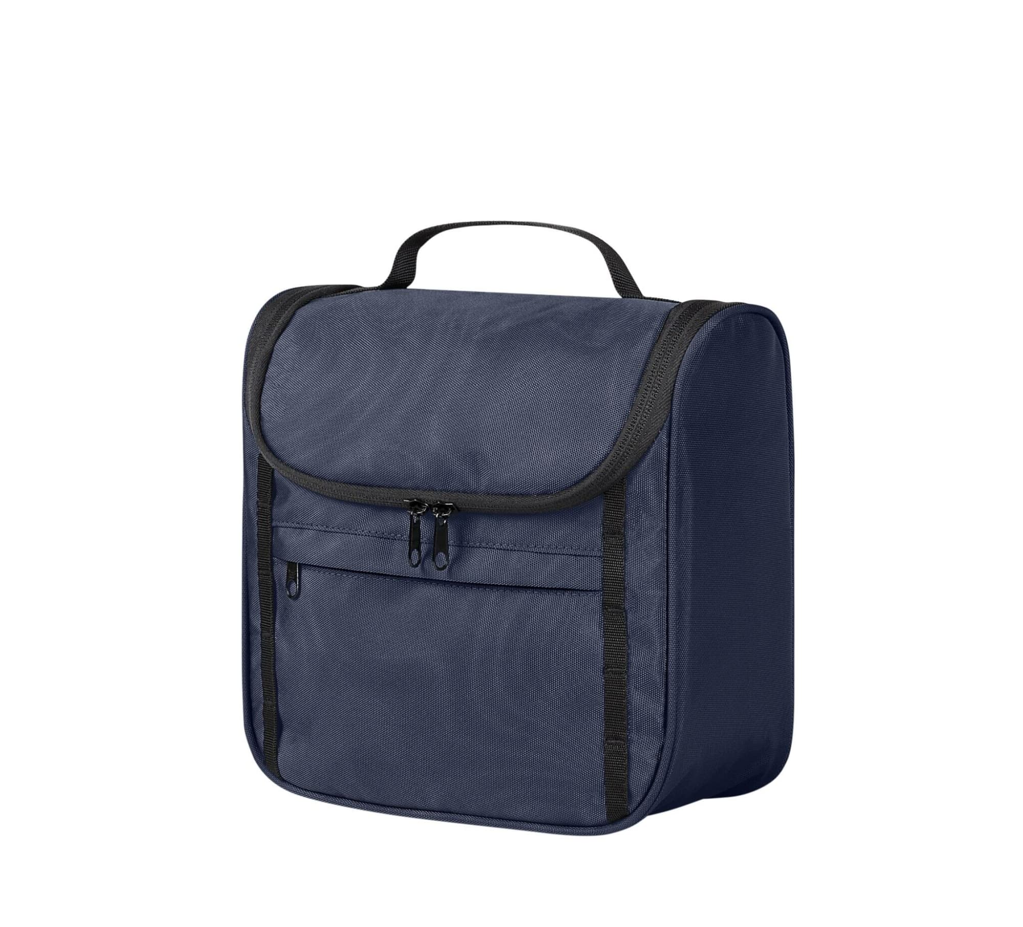 A navy toiletry bag with a flap closure, featuring a front zip pocket and a sturdy handle. It has branding on the side.