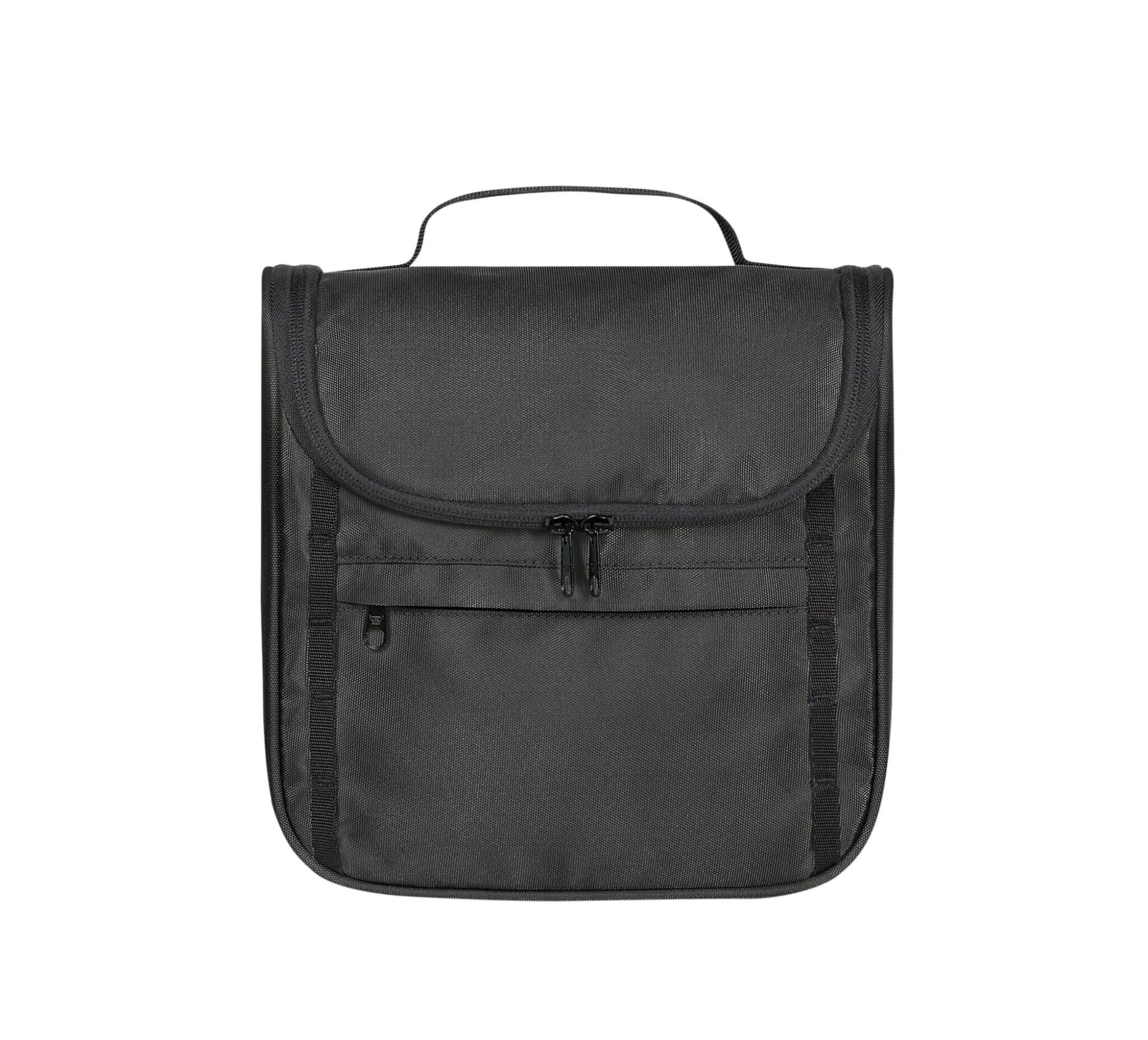A black toiletry bag with a zippered front pocket and a handle on top. It features a foldable design and has branding.