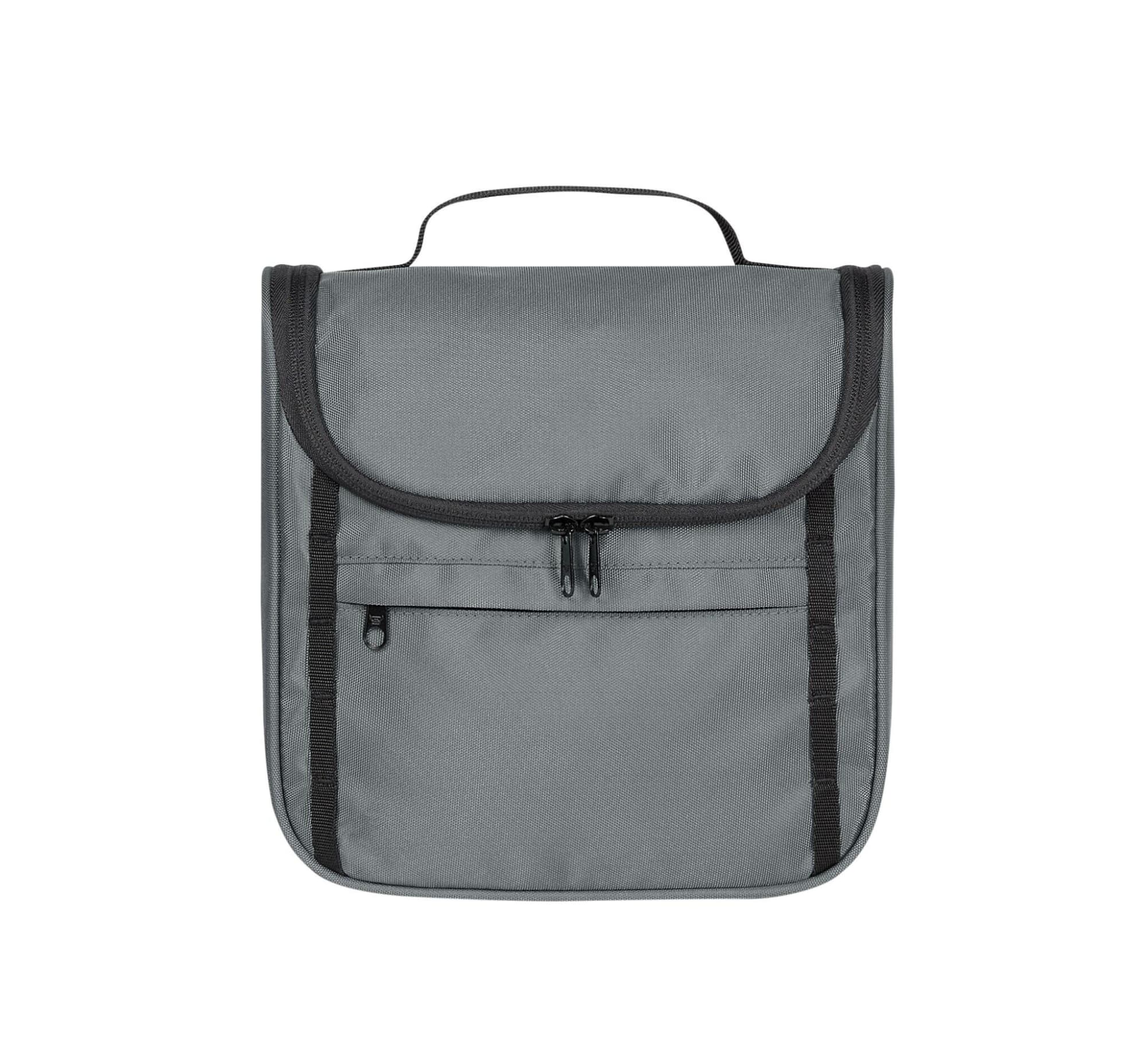 A grey toiletry bag with a flap, featuring a zippered pocket and a handle on top. It has logo branding.