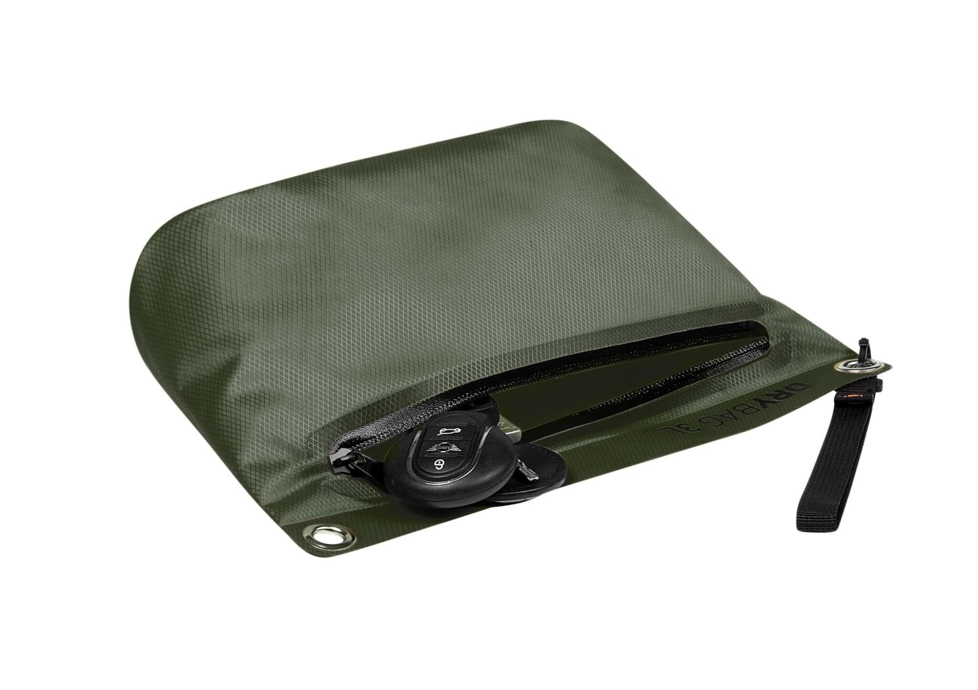 A green dry zipper bag containing car keys, featuring a zip closure and a small loop for attachment.