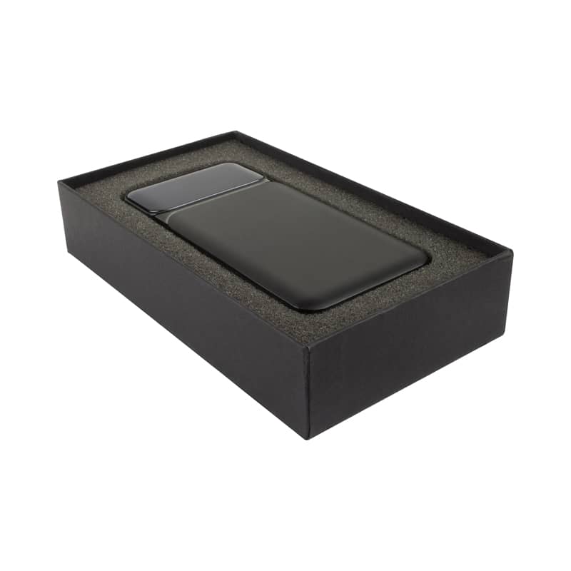 A dark green wireless power bank in a black presentation box, featuring a sleek design and branding.