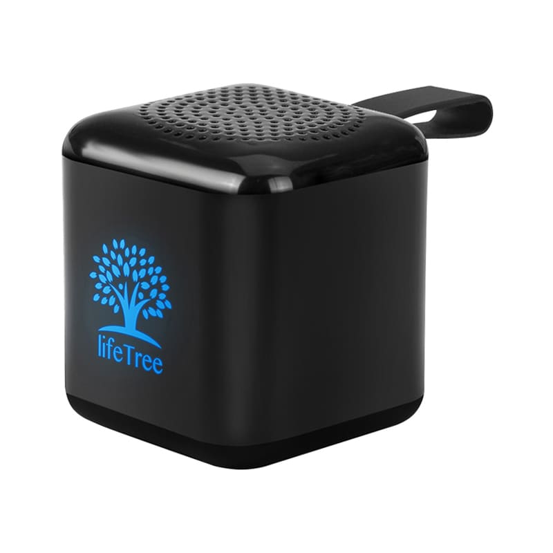 A black mini cube Bluetooth speaker with a textured top and a logo. It features a small handle for portability.