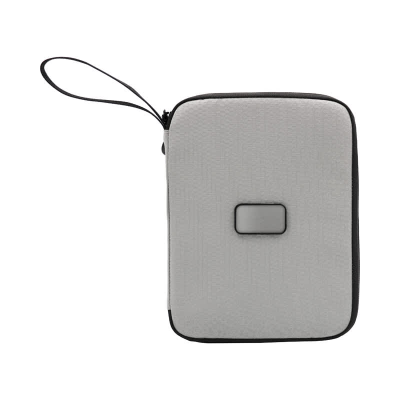 A light grey eco-friendly travel wallet with a zipper and a small branding logo on the front.