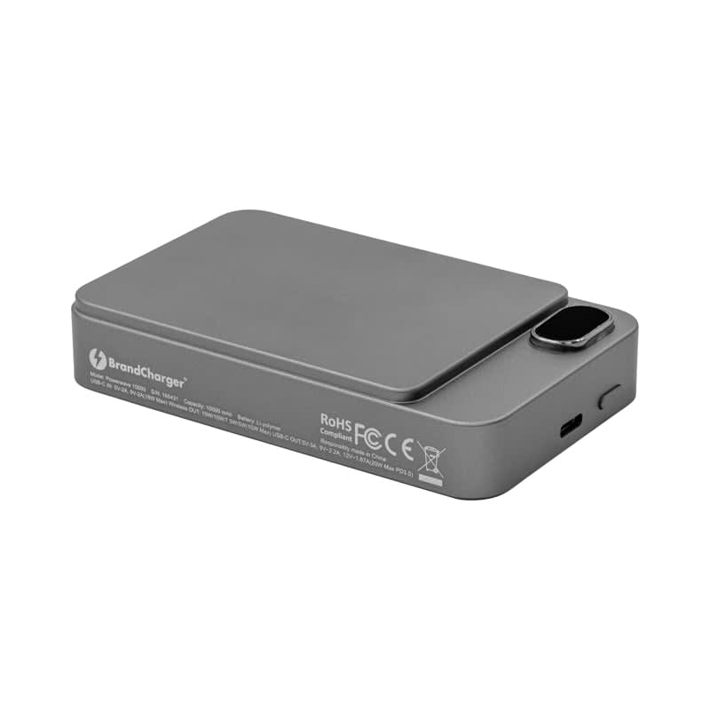 A grey wireless power bank with a sleek design, featuring a logo and a charging port.