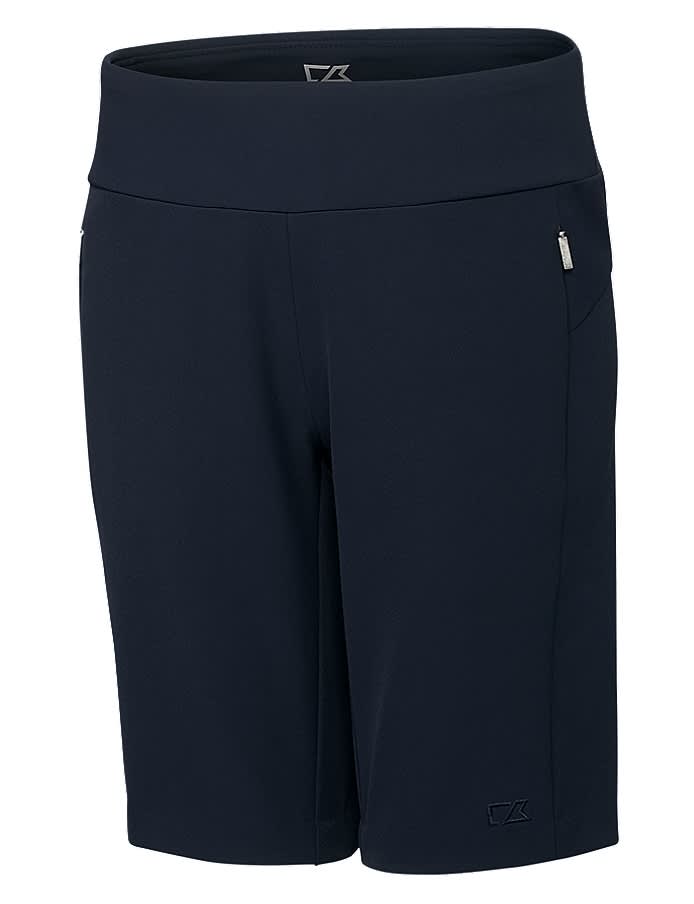 A pair of navy blue dress shorts featuring a smooth waistband and a side pocket. The shorts have a logo on the side.