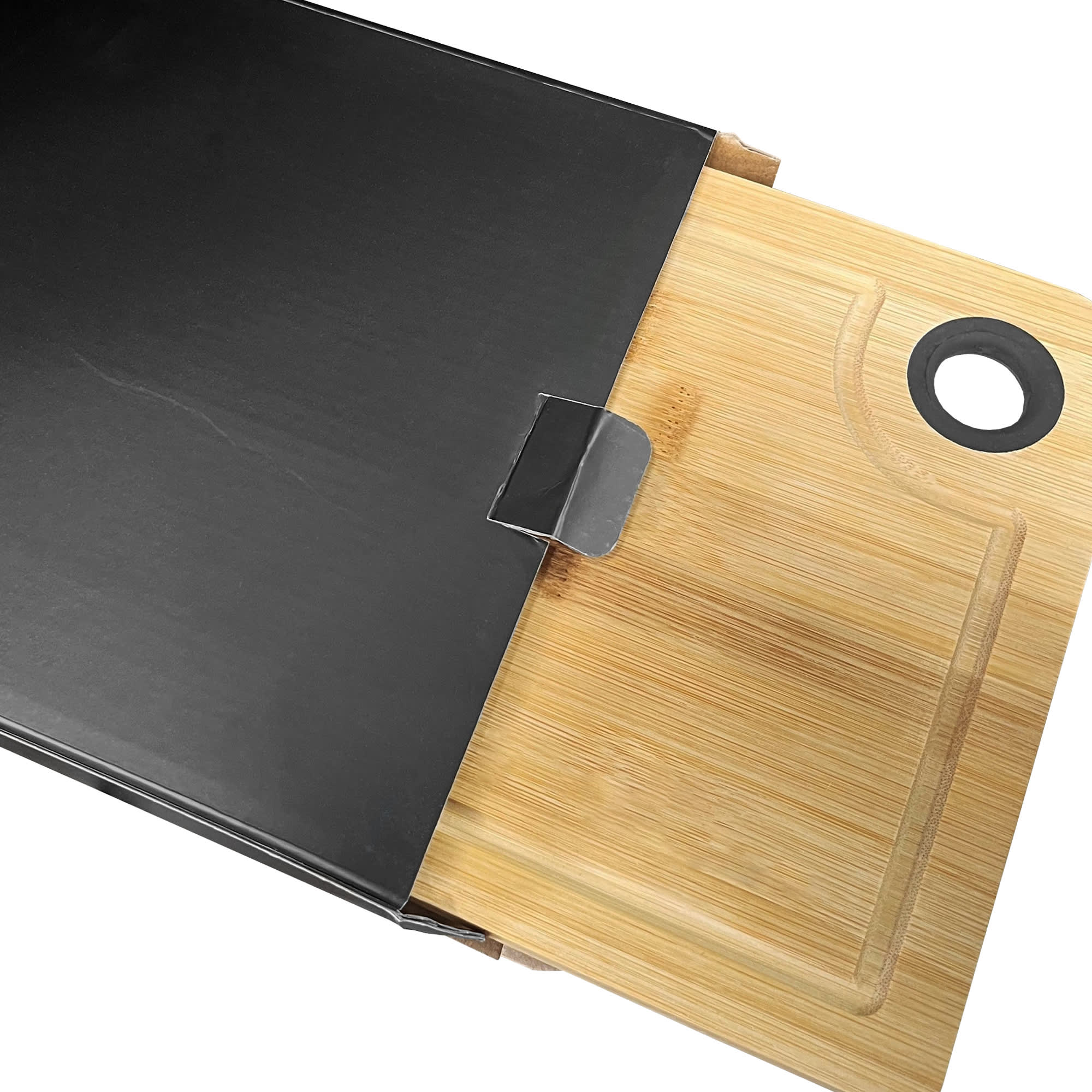 A wooden cheeseboard with a smooth finish, featuring a circular cutout, partially revealed from a black box.