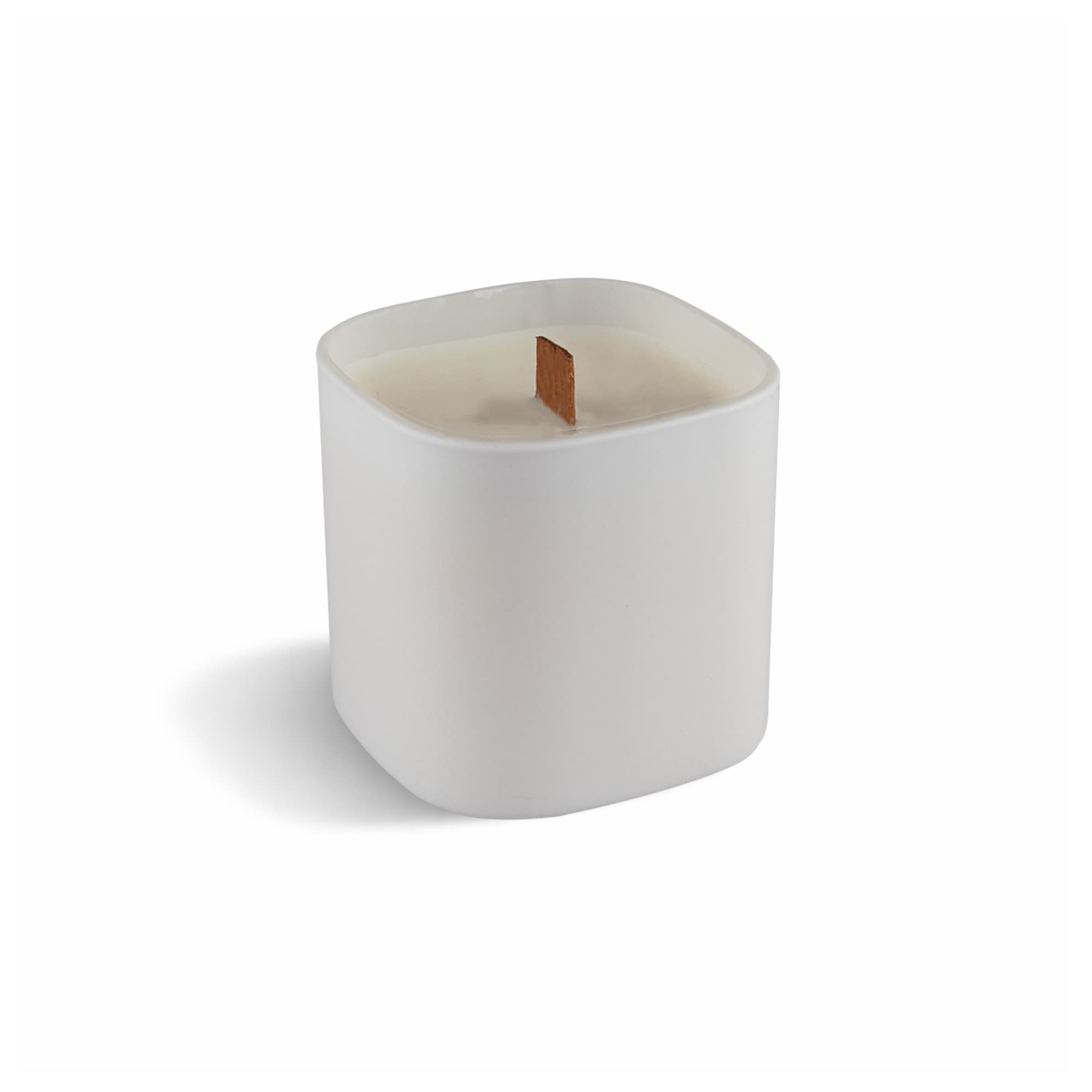 A premium square glass candle in white, featuring a wood wick. It has a smooth, minimalist design and a logo.