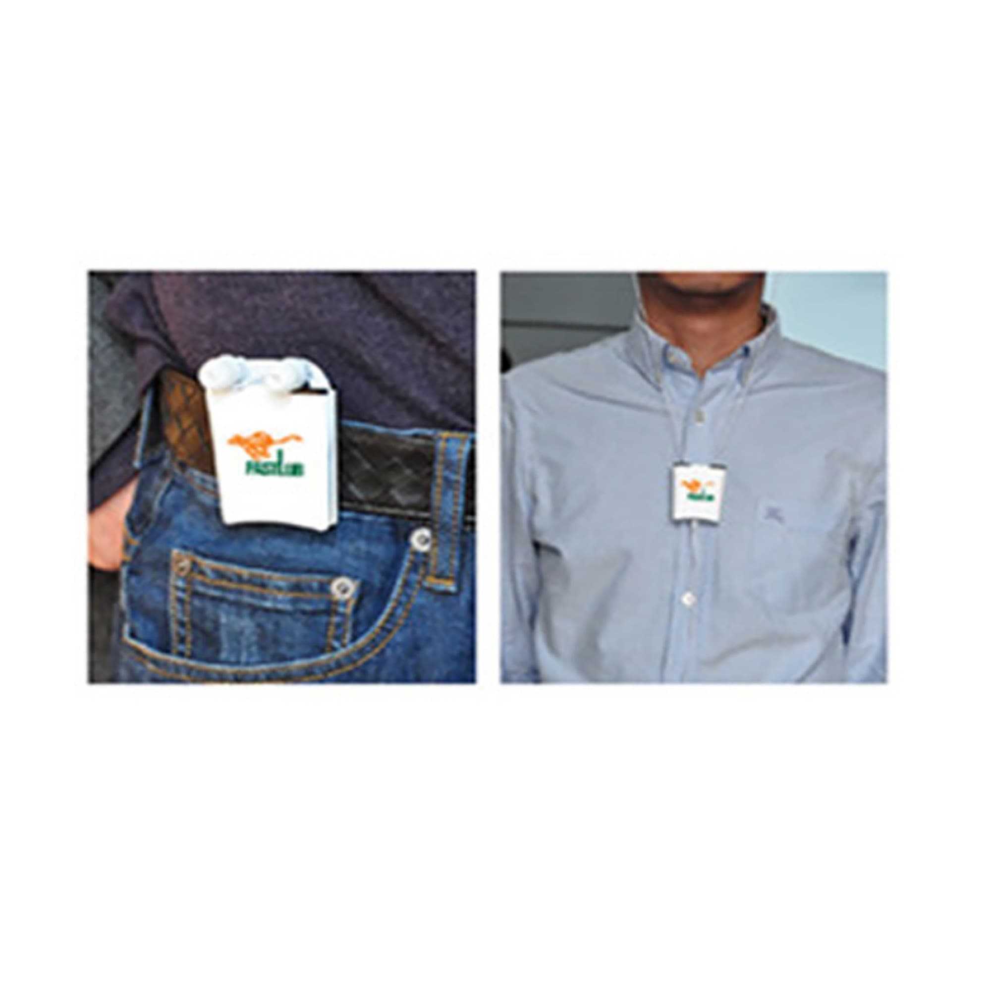 A pair of white earbuds in a compact carrying case, featuring a logo, attached to a belt and worn on a shirt.