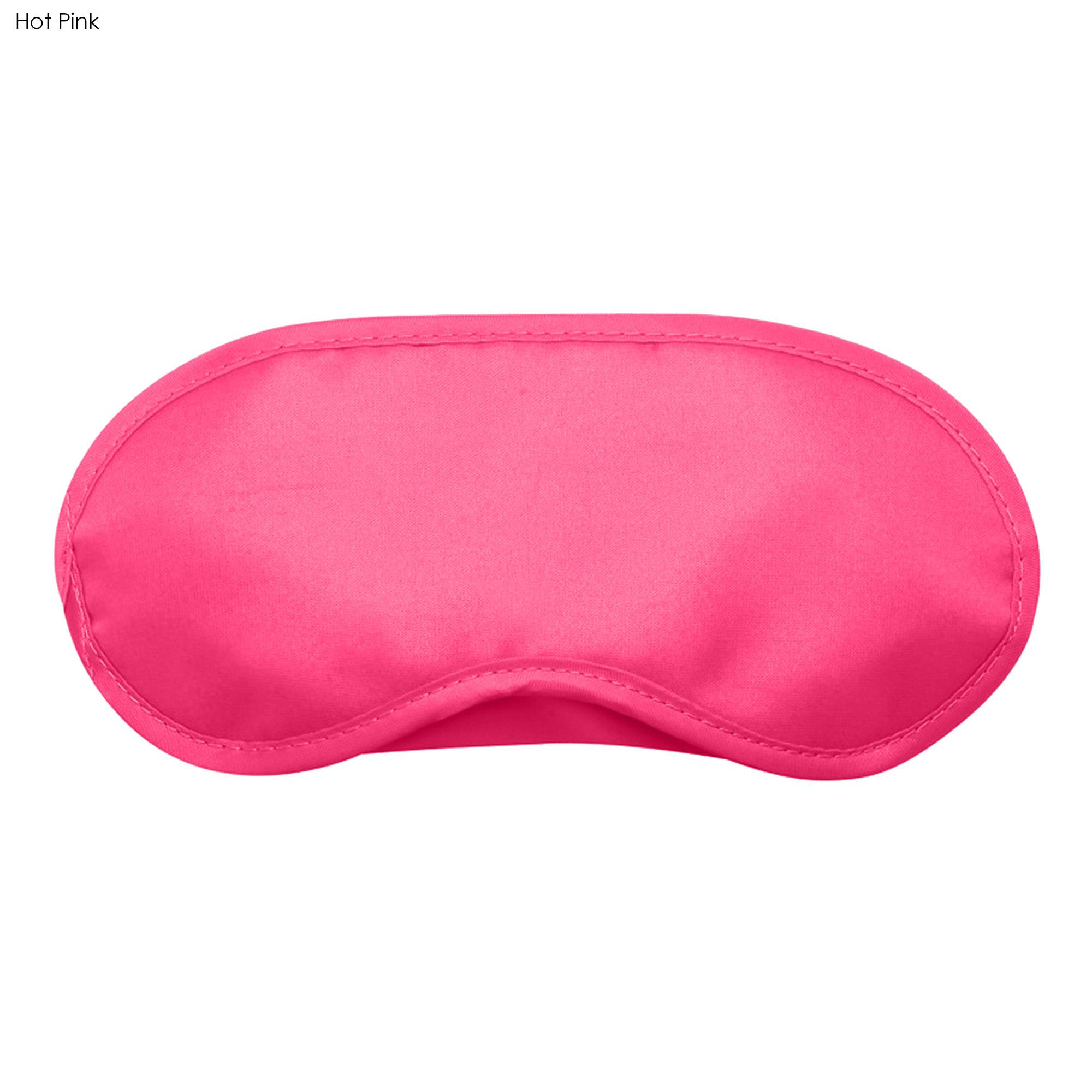 A hot pink sleep eye mask featuring a soft texture, designed to block out light for better sleep.