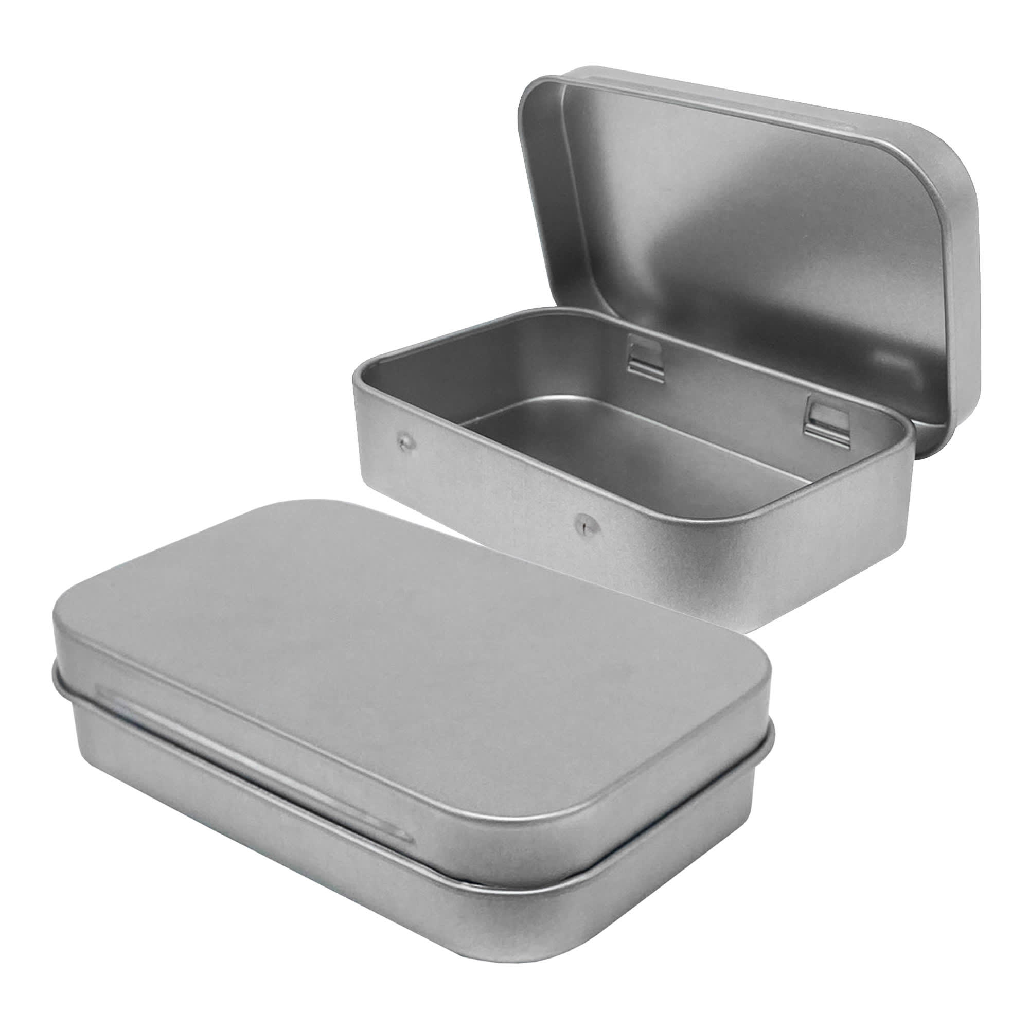 A metal tin in silver featuring a hinged lid, open to reveal an empty interior.