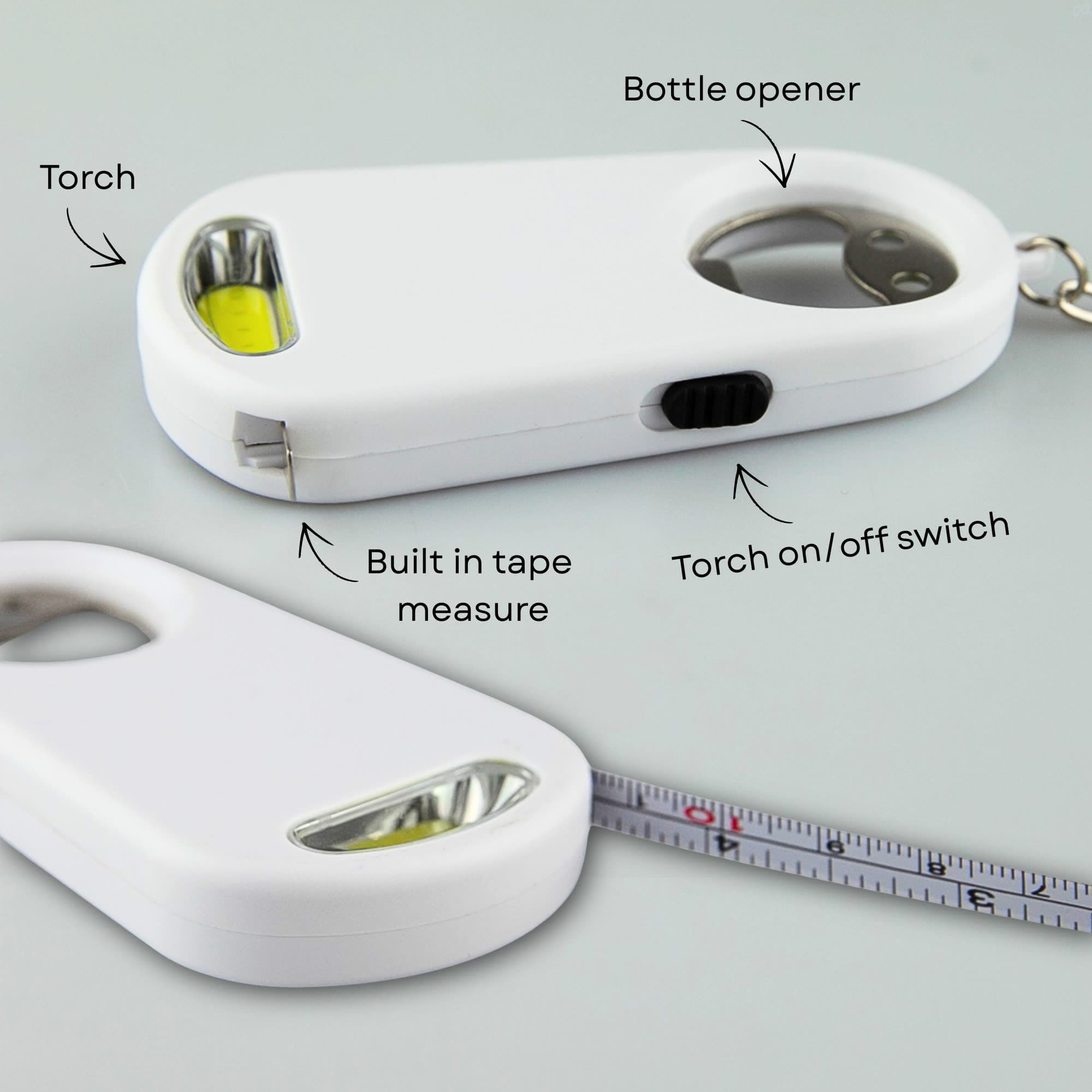 A drink bottle opener key ring in white with a built-in torch and tape measure, featuring a logo.