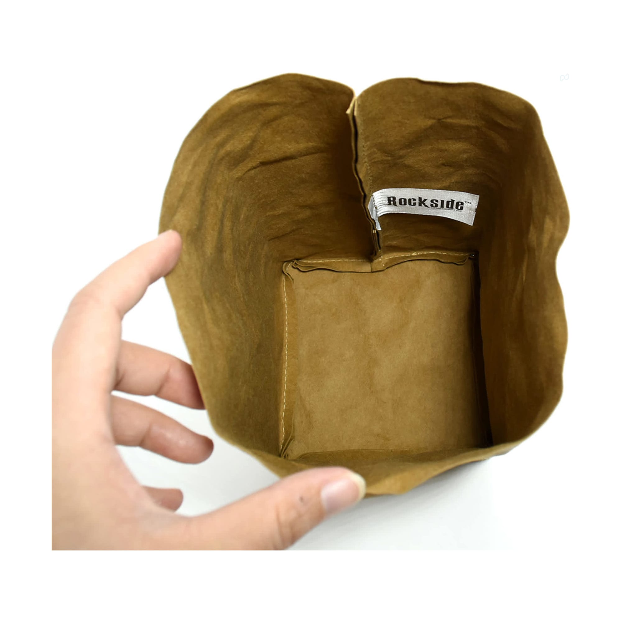 A medium-sized, brown kraft paper storage bag with a rectangular base and a label inside.