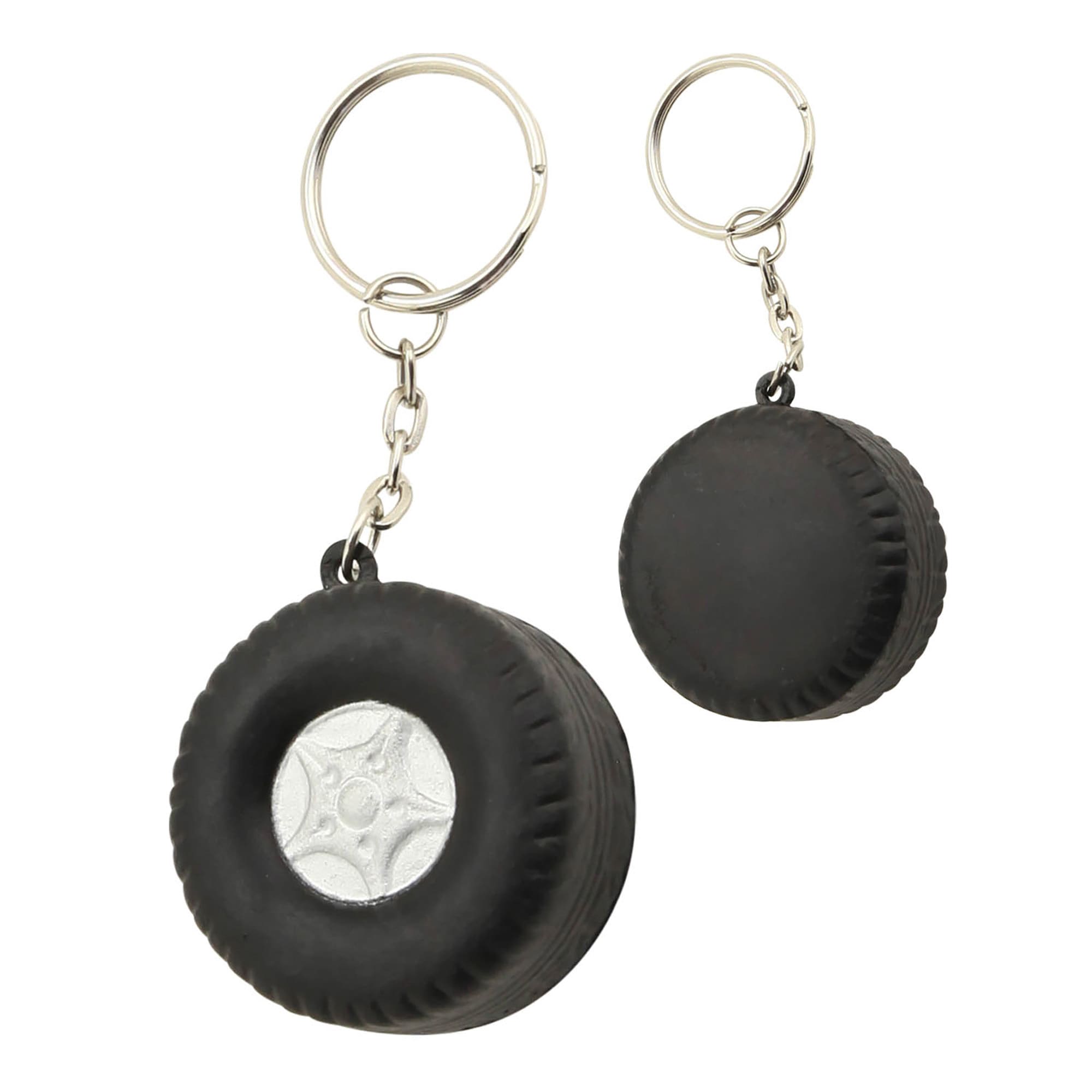 A black tyre-shaped key ring with a silver centre, featuring a metal chain and keyring attachment.