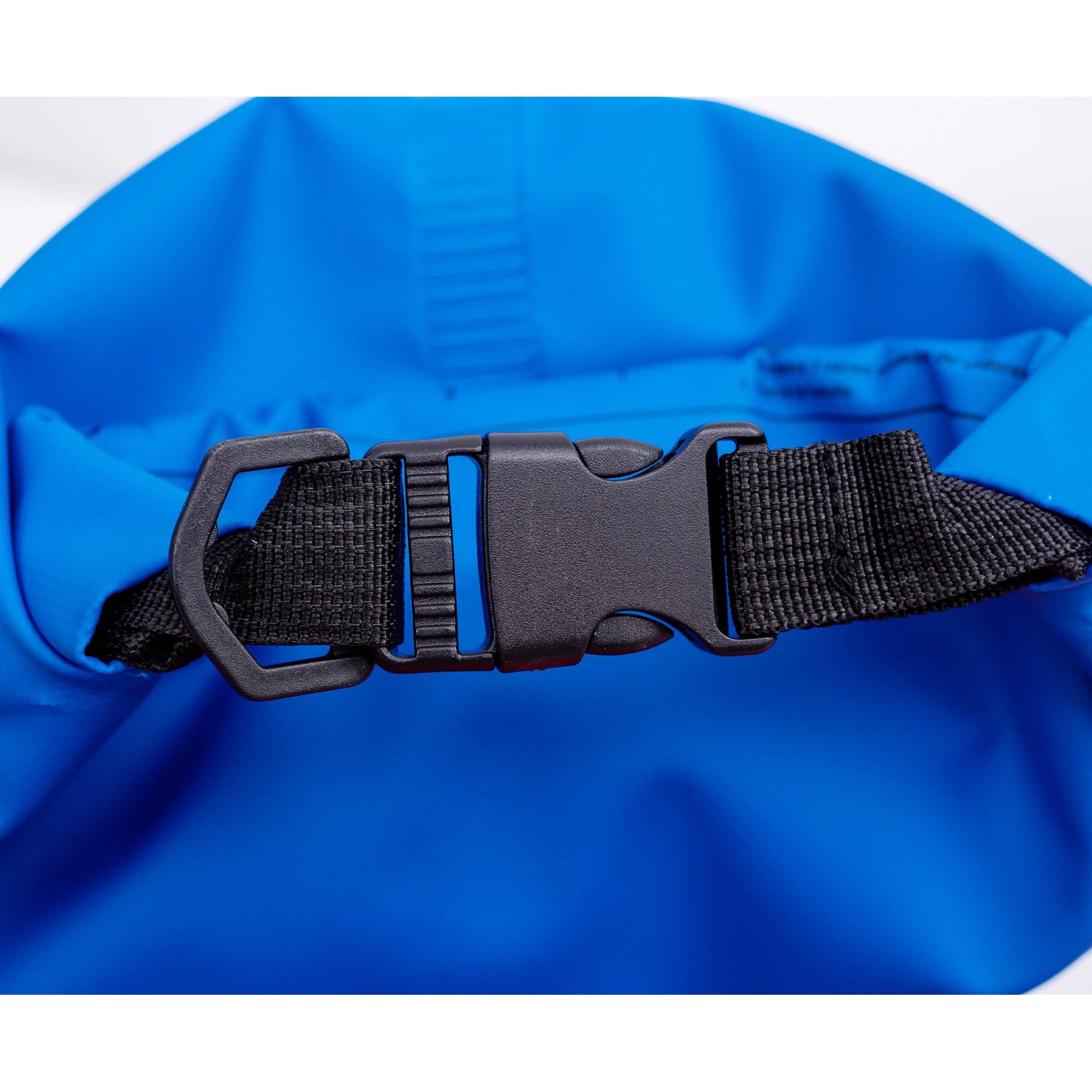 A blue dry sack featuring a black clip buckle and adjustable strap for fastening. It has a smooth, waterproof surface.