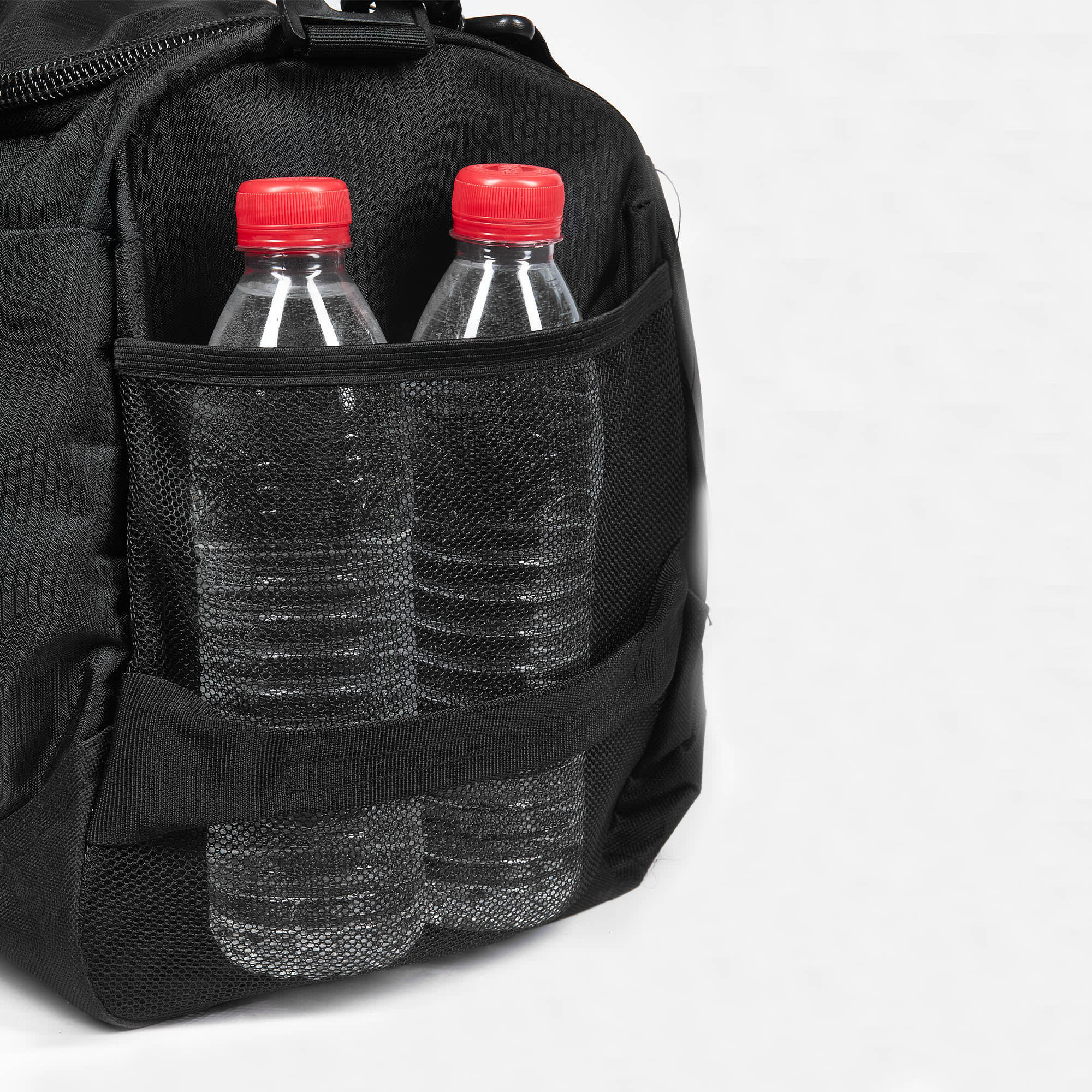 A black sport bag with two water bottles secured in a mesh pocket on the side. It features a simple logo.