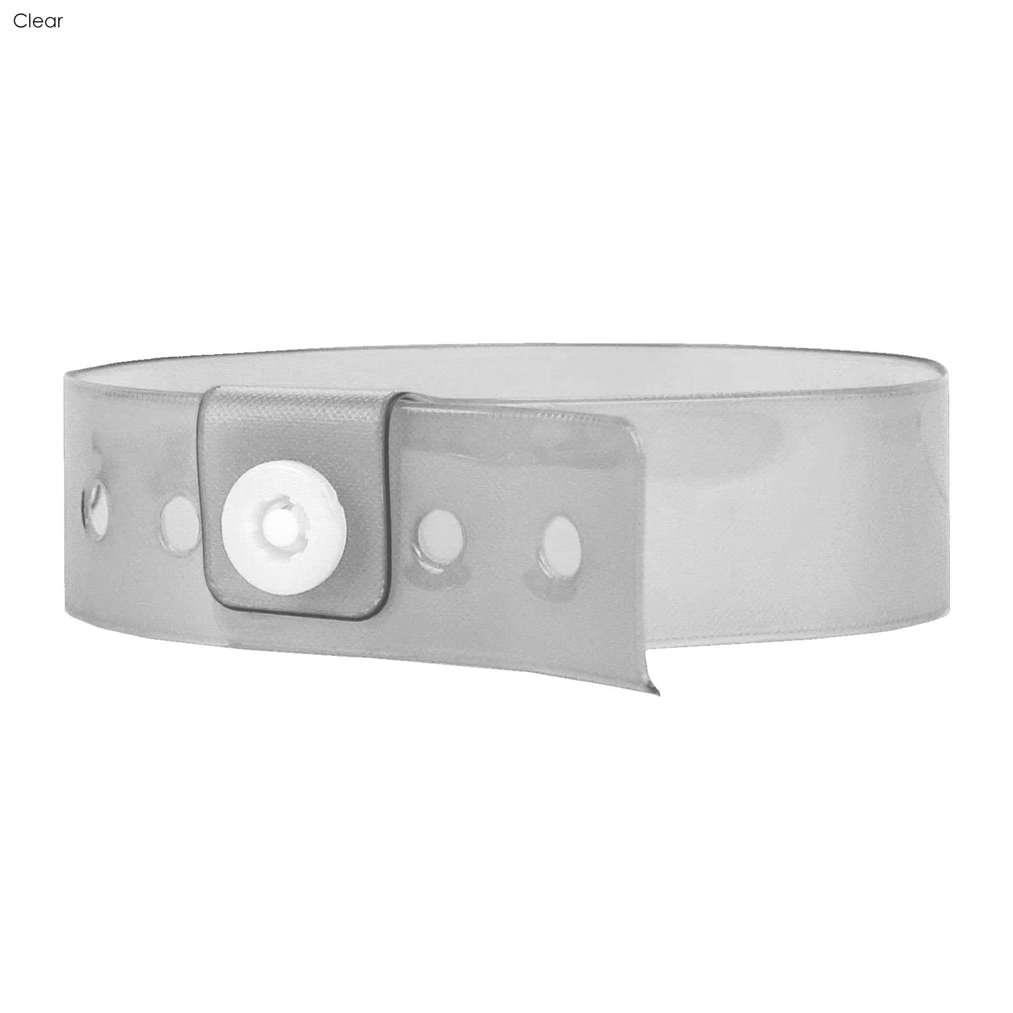 A clear vinyl wristband with a button snap closure and multiple adjustment holes.