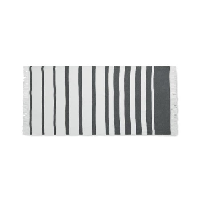 A striped throw blanket featuring alternating white and dark grey stripes with fringing on the edges.