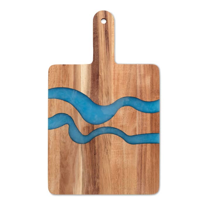 A wooden chopping board featuring blue resin waves along its surface. It has a handle for easy use.