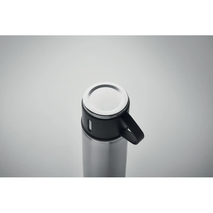 A drink bottle with a sleek silver body and a black lid featuring a handle and a logo.