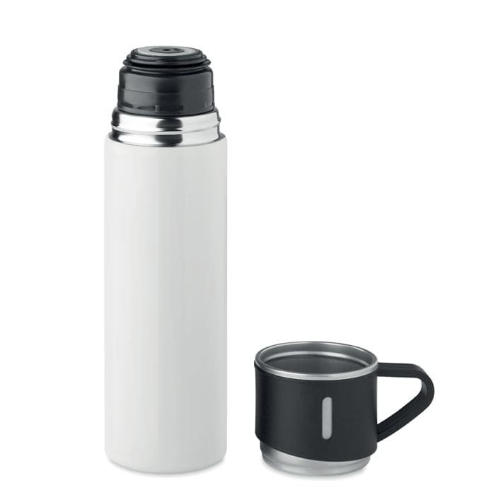 A drink bottle with a sleek white exterior and a stainless steel lid, accompanied by a black cup with a handle.