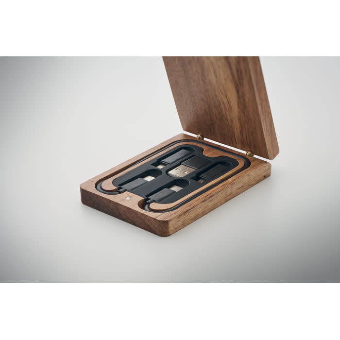 A wooden box opens to reveal a sleek, black interior with compartments for various items. It features a simple design.