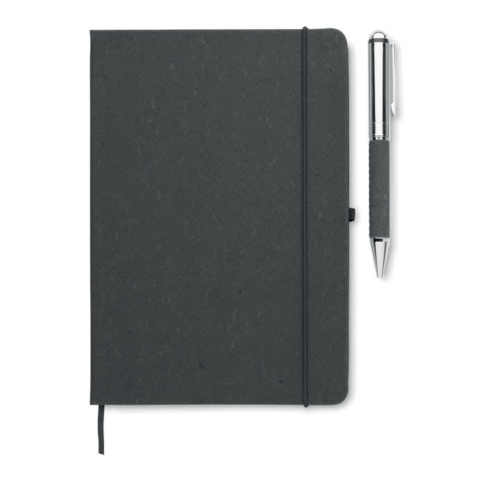 A dark grey notebook with a pen placed beside it. The notebook features an elastic closure and a textured cover.