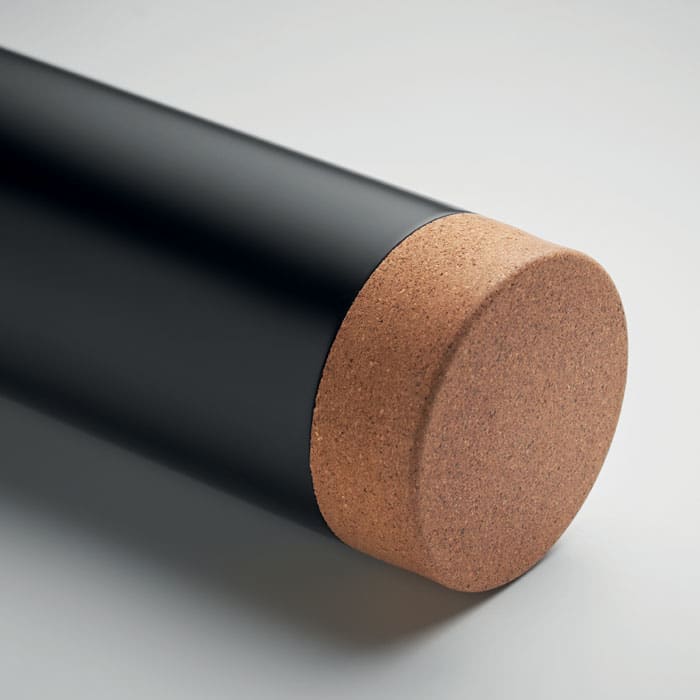 A drink bottle with a sleek black metal body and a cork base. It features a simple, modern design.