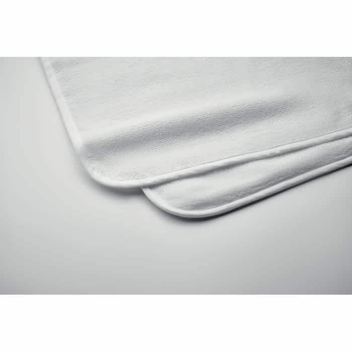 A soft, white blanket with rounded corners, featuring a smooth texture and subtle stitching.
