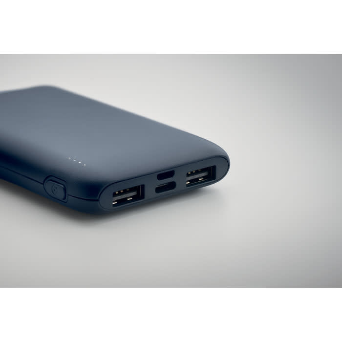 A power bank in navy blue with USB ports and a sleek design, featuring a minimalistic style and no visible branding.