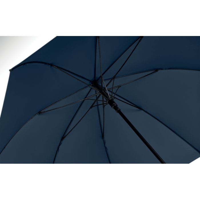 A dark blue umbrella with a black handle, displaying the inner structure and ribs.