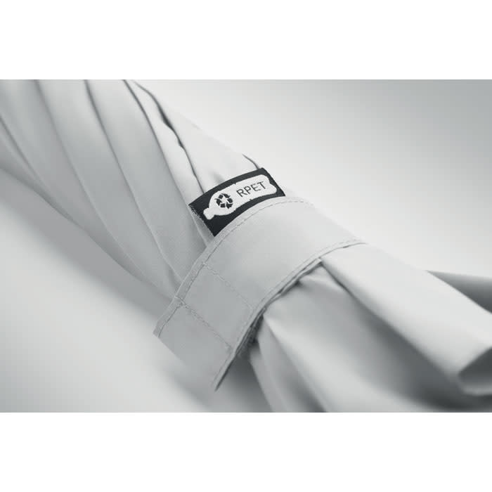 A drink bottle in a soft grey colour featuring a fabric texture and a branding label.