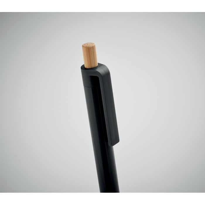 A pen with a black body and a wooden top, featuring a sleek design and a clip.