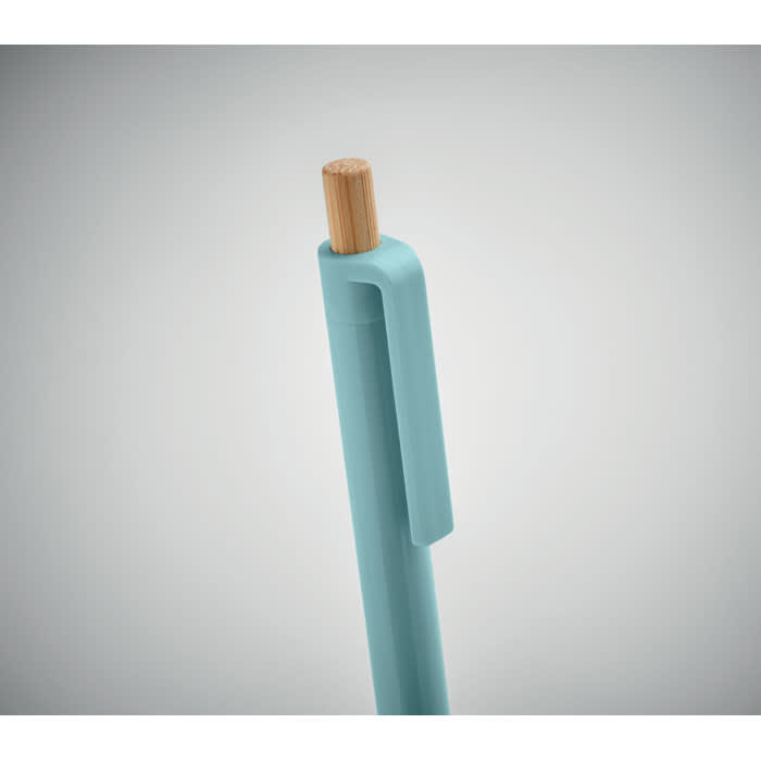 A teal drink bottle with a wooden lid and a clip feature, showcasing a sleek design.