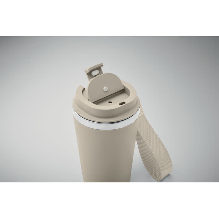 A drink bottle in a soft beige colour with a flip-top lid and a textured carry strap. It features a logo.