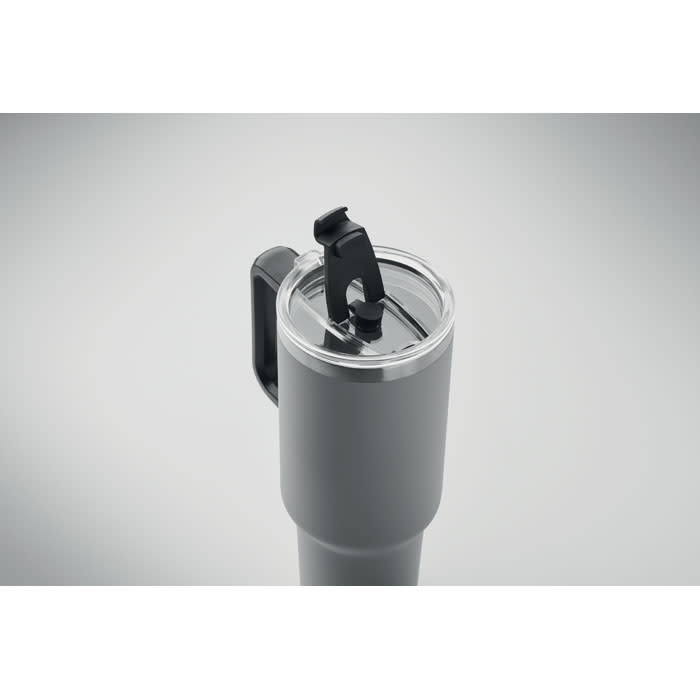 A drink bottle in matte grey with a clear lid and a black silicone strap for easy handling.