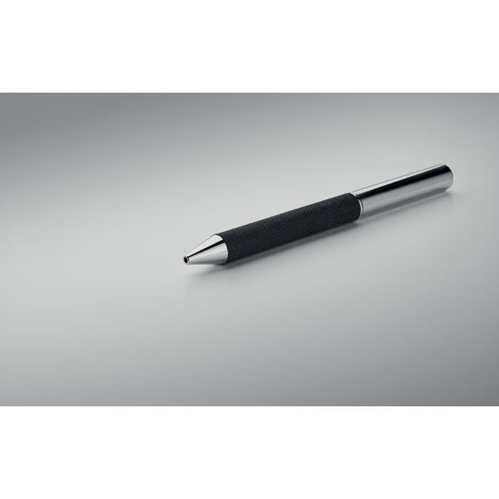 A sleek black pen with a textured grip and shiny silver tip, resting on a smooth grey surface.