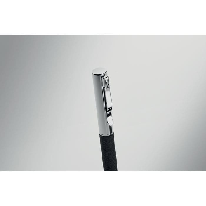 A sleek black pen with a chrome clip, featuring a smooth, minimalist design and reflective surface.