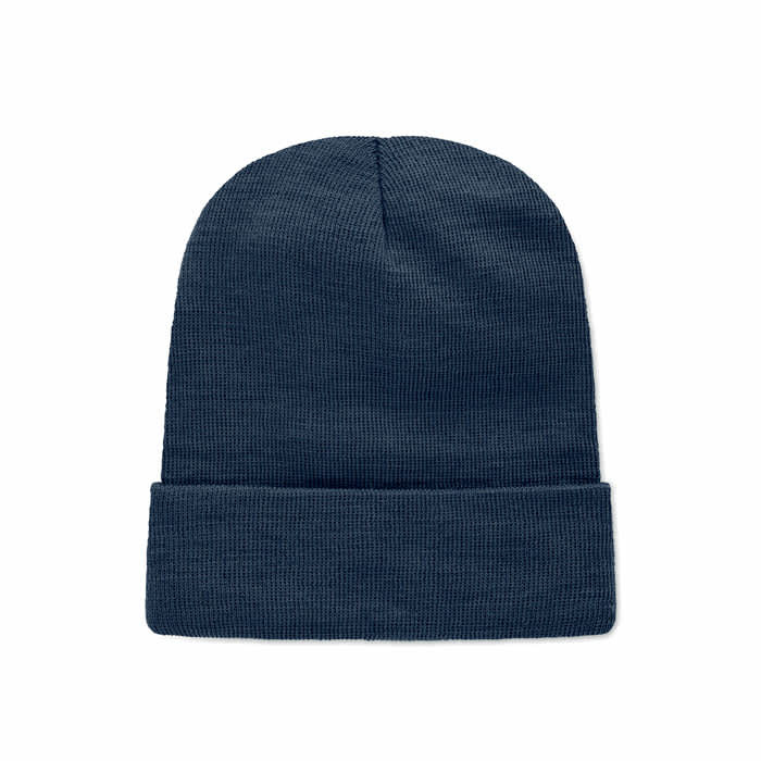 A dark navy beanie hat with a knitted texture and a rolled cuff at the bottom. It features a logo on the side.