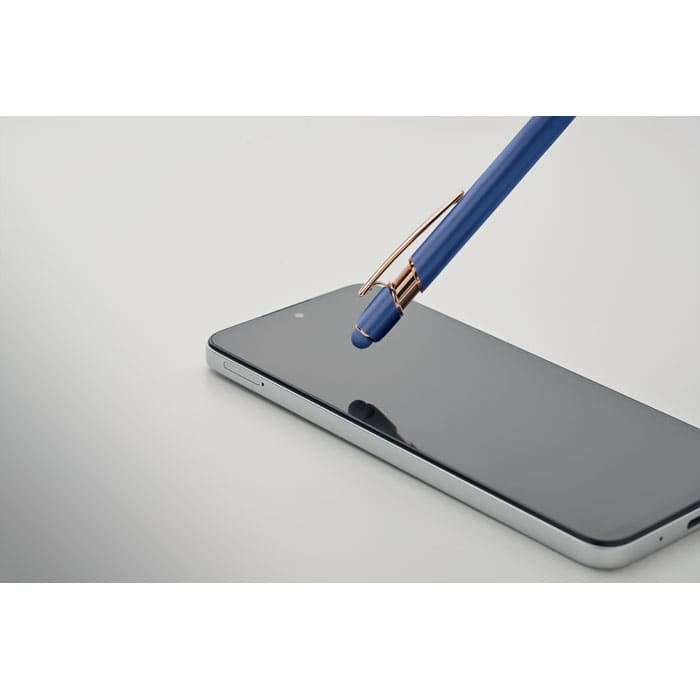 A blue pen is poised above a sleek smartphone screen, highlighting its reflective surface. The pen features a stylish clip.