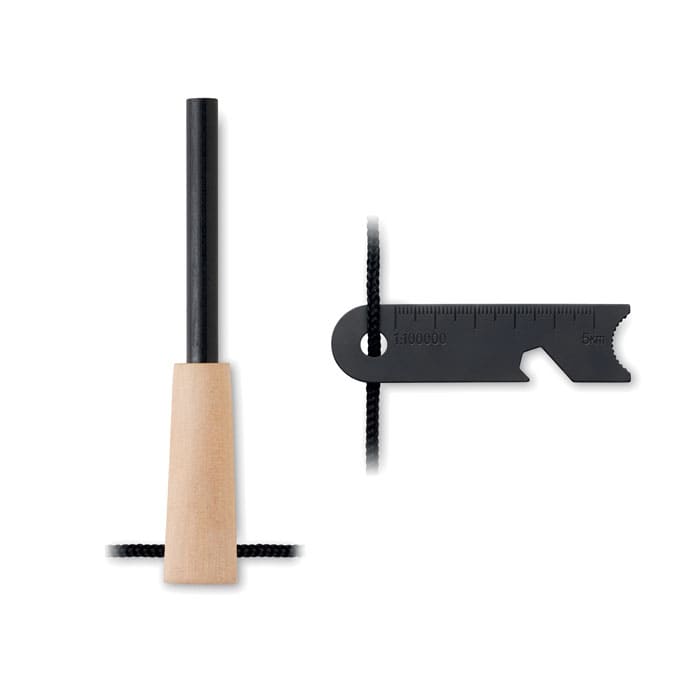 A fire starter kit featuring a wooden handle, black steel rod, and a multi-tool with measurement markings.