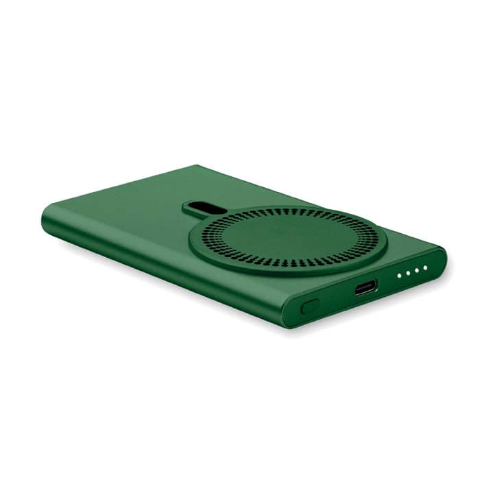 A green portable charger with a circular design, featuring a USB-C port and indicator lights.